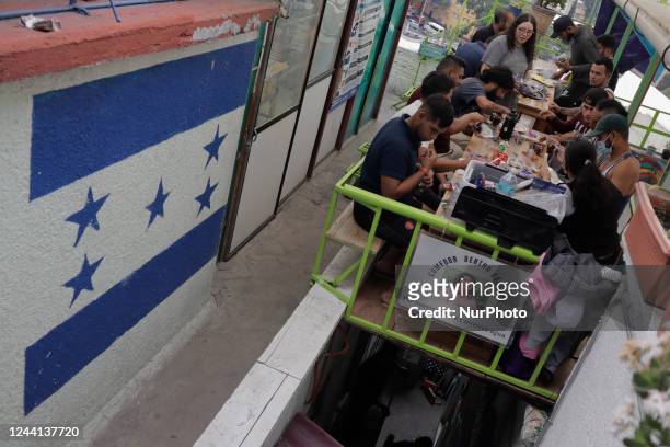 Group of Venezuelan migrants at lunchtime at a shelter in Mexico City, who have left their country of origin for various political, economic and...