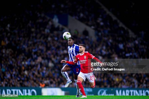Zaidu Sanusi of FC Porto and Rafa Silva of SL Benfica battle for the ball during the Liga Portugal Bwin match between FC Porto and SL Benfica at...