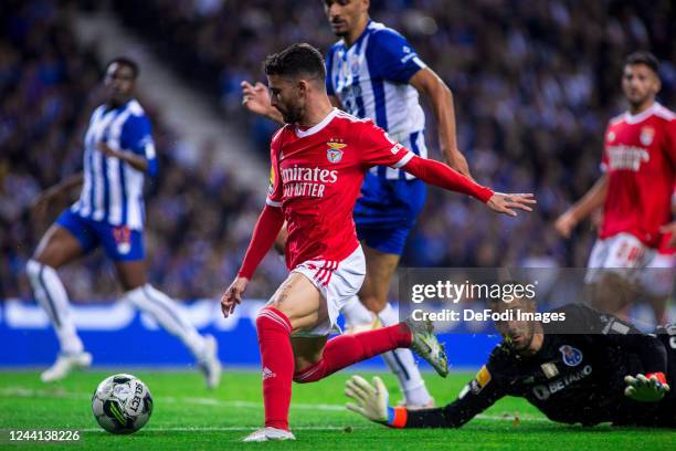 Diogo Costa of FC Porto and Rafa Silva of SL Benfica battle for the ball during the Liga Portugal Bwin match between FC Porto and SL Benfica at...