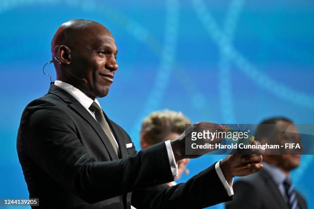 Draw Assistant Geremi Njitap draws Nigeria during the FIFA Women's World Cup 2023 Final Draw at the Aotea Centre on October 22, 2022 in Auckland, New...