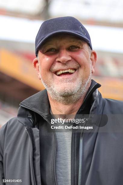 Joerg Schmadtke of VfL Wolfsburg looks on during the Bundesliga match between Bayer 04 Leverkusen and VfL Wolfsburg at BayArena on October 22, 2022...