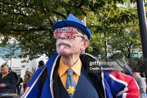 Pro-EU demonstrator wears galsses with a Union Jack pattern ahead of a march in central London calling for the UK to rejoin the European Union in...