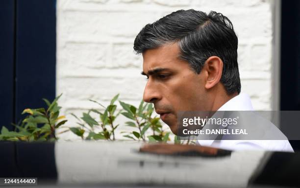 Britain's former Chancellor of the Exchequer, Conservative MP, Rishi Sunak leaves his home in London on October 22, 2022. - Former prime minister...