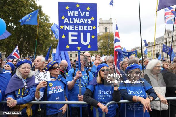 Demonstrators attend the National Rejoin March in Parliament Square on October 22, 2022 in London, United Kingdom. Protesters implore the government...