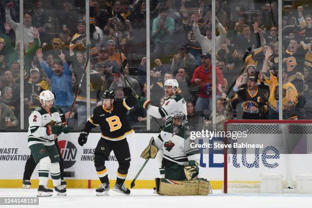 Charlie Coyle of the Boston Bruins celebrates the first period goal against the Minnesota Wild at the TD Garden on October 22, 2022 in Boston,...