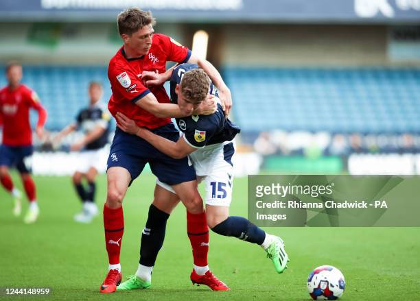 West Bromwich Albion's Adam Reach tussles with Millwall's Charlie Cresswell during the Sky Bet Championship match at The Den, London. Picture date:...