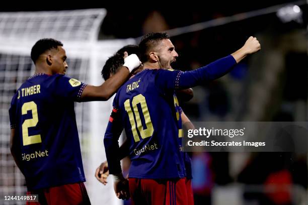 Steven Berghuis of Ajax celebrates 1-2 with Dusan Tadic of Ajax, Calvin Bassey of Ajax, Jurrien Timber of Ajax during the Dutch Eredivisie match...