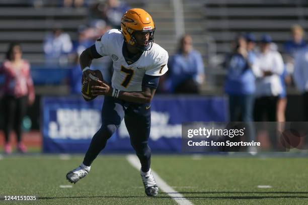 Toledo Rockets quarterback Dequan Finn scrambles during the first quarter of a college football game against the Buffalo Bulls on October 22 at UB...