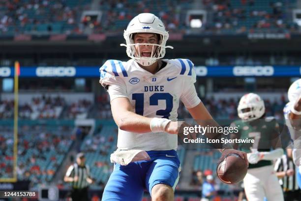 Duke Blue Devils quarterback Riley Leonard celebrates his rushing touchdown during the game between the Duke Blue Devils and the Miami Hurricanes on...