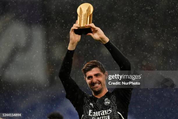 Thibaut Courtois goalkeeper of Real Madrid and Belgium shows his recently won trophy to his fans during the La Liga Santander match between Real...