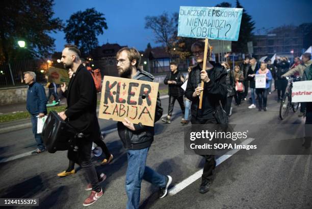 Protesters march through the streets during the demonstration. Exactly two years ago, the Constitutional Court in Poland amended the abortion law to...