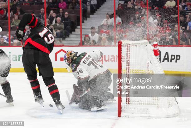 Drake Batherson of the Ottawa Senators tries to get the puck past Karel Vejmelka of the Arizona Coyotes in the second period of the game at Canadian...