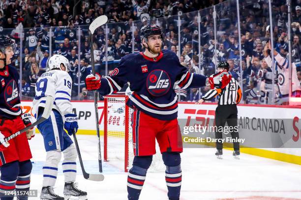 Pierre-Luc Dubois of the Winnipeg Jets celebrates after scoring a first period goal against the Toronto Maple Leafs at the Canada Life Centre on...