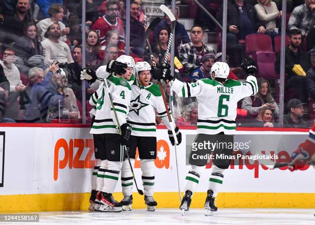 Joe Pavelski of the Dallas Stars celebrates his goal with teammates Miro Heiskanen and Colin Miller during the second period of the game against the...