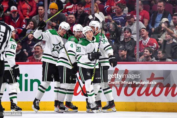 Jason Robertson of the Dallas Stars skates off after celebrating his goal with teammates during the second period of the game against the Montreal...