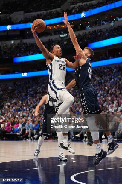 Desmond Bane of the Memphis Grizzlies drives to the basket against the Dallas Mavericks on October 22, 2022 at the American Airlines Center in...