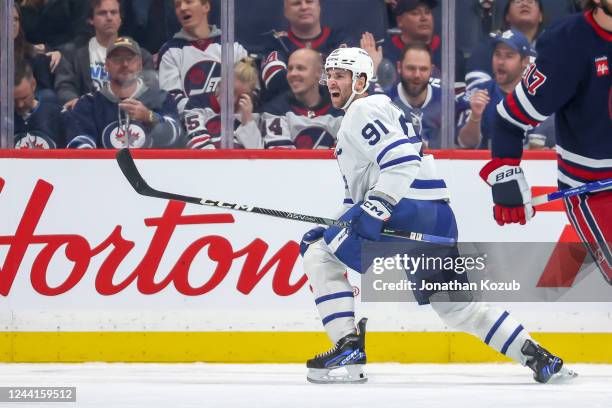 John Tavares of the Toronto Maple Leafs celebrates after scoring a second period goal against the Winnipeg Jets at the Canada Life Centre on October...