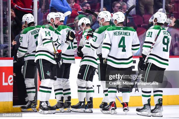 The Dallas Stars celebrate their victory against the Montreal Canadiens at Centre Bell on October 22, 2022 in Montreal, Quebec, Canada. The Dallas...