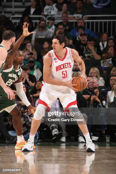 Boban Marjanovic of the Houston Rockets looks to pass the ball during the game against the Milwaukee Bucks on October 22, 2022 at the Fiserv Forum...