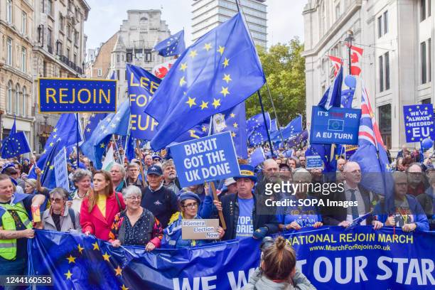 Protesters march with EU flags and pro-EU placards during the demonstration near Trafalgar Square. Thousands of people marched through Central London...
