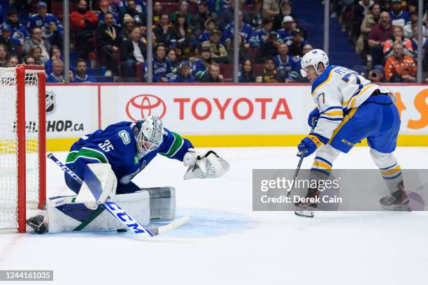 Thatcher Demko of the Vancouver Canucks makes a save against JJ Peterka of the Buffalo Sabres in the second period during the game at Rogers Arena...