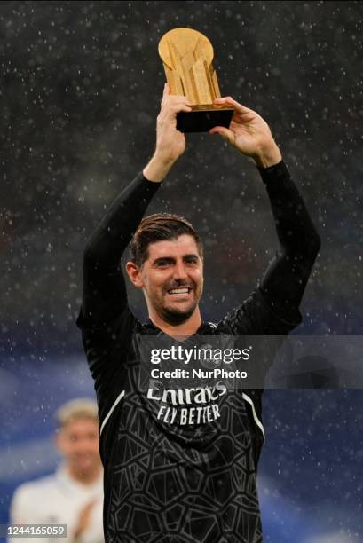 Thibaut Courtois goalkeeper of Real Madrid and Belgium shows his recently won trophy to his fans during the La Liga Santander match between Real...