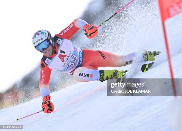 Switzerland's Fadri Janutin competes during the first run of the men's Giant Slalom event during the FIS Alpine Ski World Cup in Soelden, Austria, on...