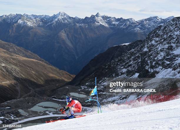 Switzerland's Marco Odermatt competes during the first run of the men's Giant Slalom event during the FIS Alpine Ski World Cup in Soelden, Austria,...