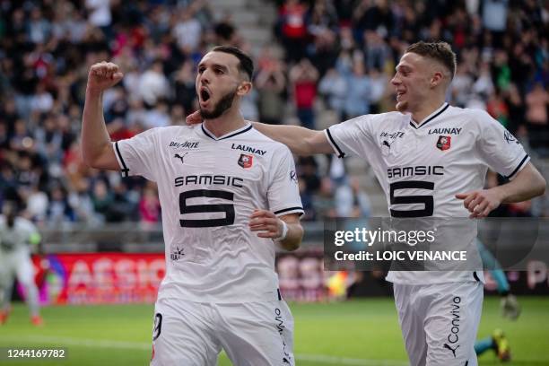 Rennes' French forward Amine Gouiri celebrates after scoring during the French L1 football match between SCO Angers and Stade Rennais FC at The...