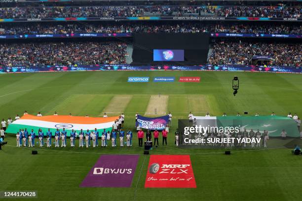 Teams India and Pakistan line up for the national anthems during the ICC men's Twenty20 World Cup 2022 cricket match between India and Pakistan at...