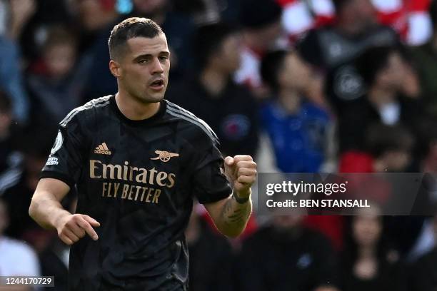 Arsenal's Swiss midfielder Granit Xhaka celebrates after scoring the opening goal of the English Premier League football match between Southampton...