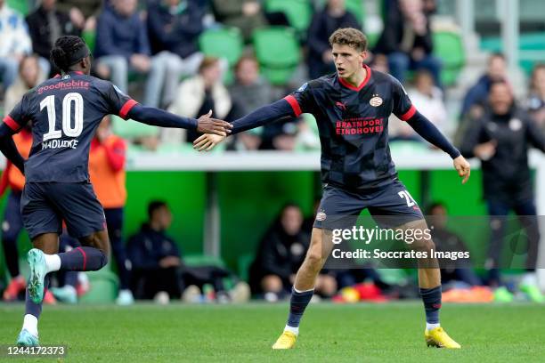 Guus Til of PSV celebrates 3-2 with Noni Madueke of PSV during the Dutch Eredivisie match between FC Groningen v PSV at the Hitachi Capital Mobility...