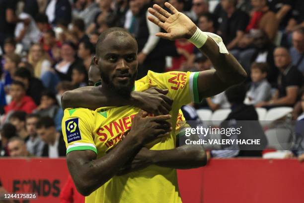 Nantes' Cameroonian forward Igniatus Ganago celebrates scoring his team's first goal during the French L1 football match between OGC Nice and FC...