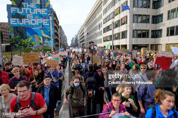 Large crowd takes part in a 'Walk For Your Future' march on October 23, 2022 in Brussels, Belgium. Some 25,000 people gathered this Sunday morning at...