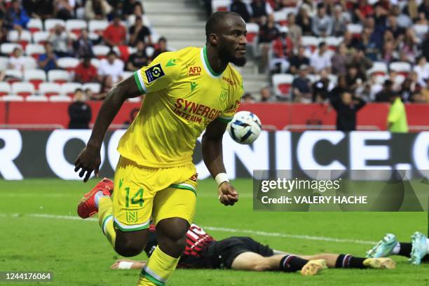 Nantes' Cameroonian forward Igniatus Ganago celebrates scoring his team's first goal during the French L1 football match between OGC Nice and FC...