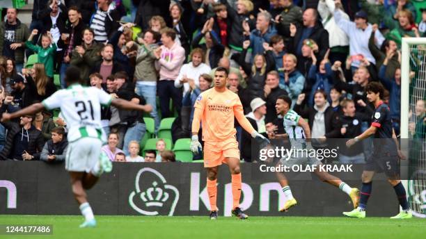 S goalkeeper Walter Benitez reacts during the Dutch Eredivisie football match between Groningen and PSV at the Euroborg stadium on October 23, 2022...