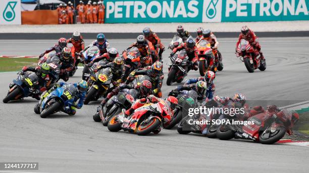 Italian rider Francesco Bagnaia of Ducati Lenovo Team leads the pack during the MotoGP race of the Petronas Grand Prix of Malaysia at Sepang...