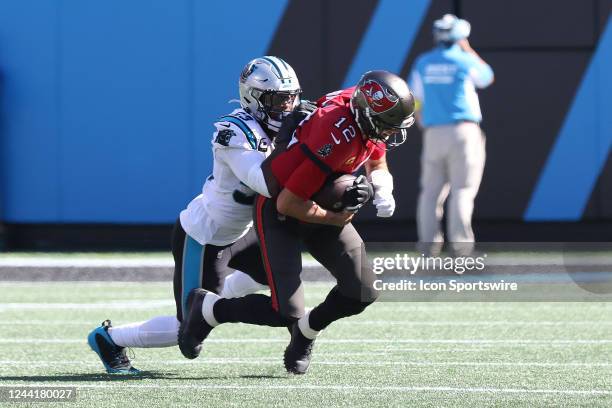 Carolina Panthers defensive end Brian Burns sacks Tampa Bay Buccaneers quarterback Tom Brady during an NFL football game between the Tampa Bay...