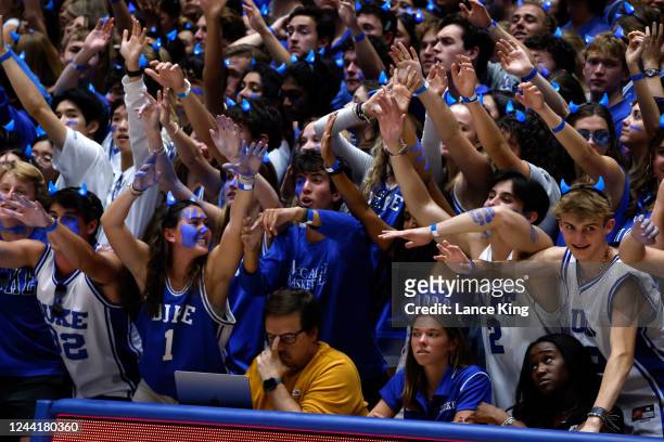 Cameron Crazies and fans of the Duke Blue Devils cheer during Countdown to Craziness at Cameron Indoor Stadium on October 21, 2022 in Durham, North...