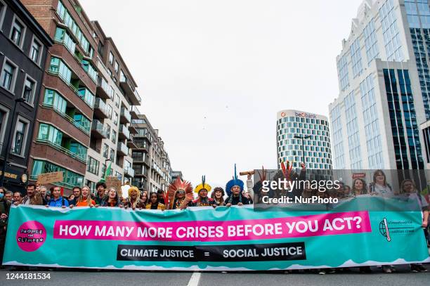 Group of indigenous people is leading the massive demonstration for the climate organized in Brussels, on October 23rd, 2022.