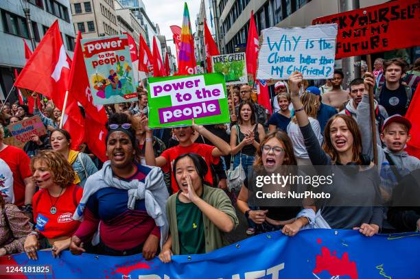 Young people are shouting slogans against climate change, Young people are holding placards in support of Rosa a little girl that died because of...