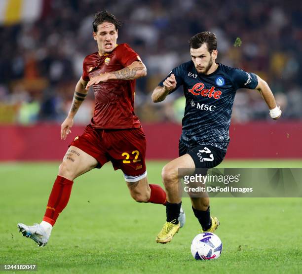 Nicolo Zaniolo of AS Roma and Khvicha Kvaratskhelia of SSC Napoli battle for the ball during the Serie A match between AS Roma and SSC Napoli at...
