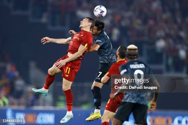 Andrea Belotti of AS Roma and Eljif Elmas of SSC Napoli battle for the ball during the Serie A match between AS Roma and SSC Napoli at Stadio...