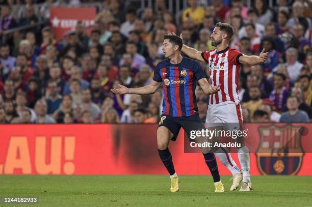 Barcelona's Polish forward Robert Lewandowski vies with Bilbaoâs defender Yeray during the La liga football match between FC Barcelona vs Bilbao FC...