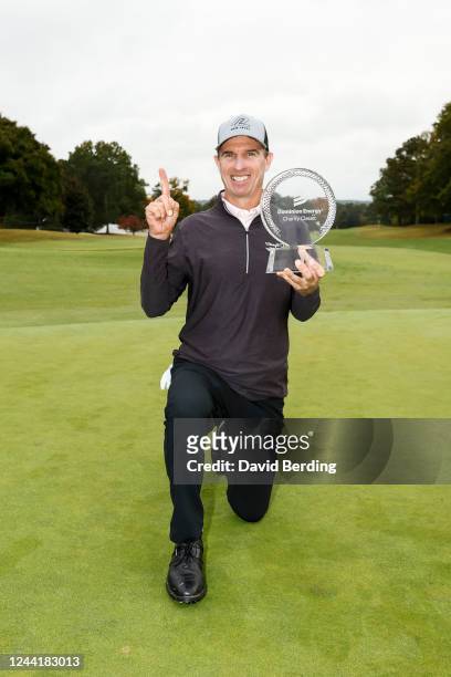 Steven Alker of New Zealand celebrates with his trophy after the final round of the Dominion Energy Charity Classic at The Country Club of Virginia...