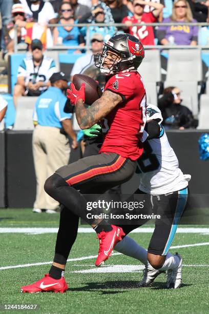 Tampa Bay Buccaneers wide receiver Mike Evans catches a pass and is quickly tackled during an NFL football game between the Tampa Bay Buccaneers and...