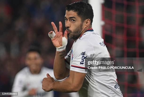 Nacional's Uruguayan forward Luis Suarez celebrates after scoring against Danubio during their Uruguayan Clausura football match at the Gran Parque...