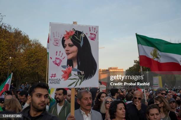 Thousands of Iranian Americans and others, carrying the Iranian flag, march during a Freedom Rally in Washington DC to show their opposition to the...