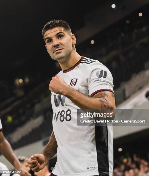 Fulham's Aleksandar Mitrovic celebrates scoring his side's second goal from a penalty during the Premier League match between Fulham FC and Aston...