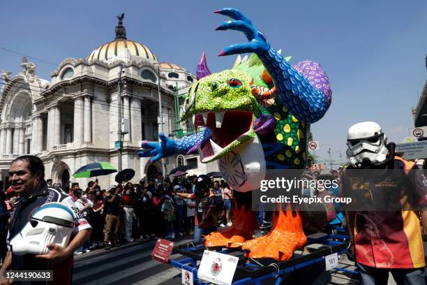 Participants take part during the 14th Monumental Alebrijes parade organized by the Museum of Popular Cultures of Mexico from zocalo to Angel of...